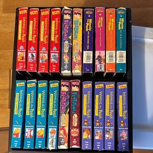 Disney VHS Set with Red, Blue, and Purple Spines